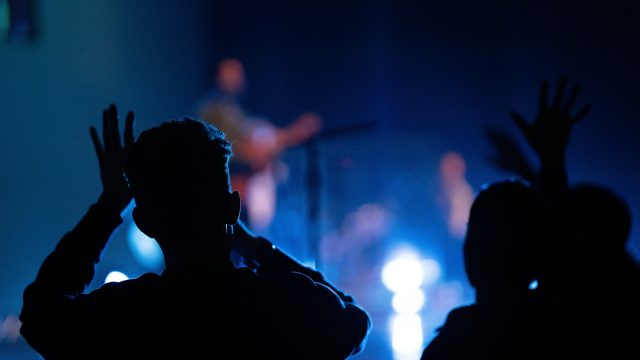People dancing to a band