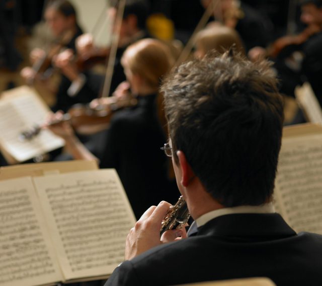 Clarinet player reading music