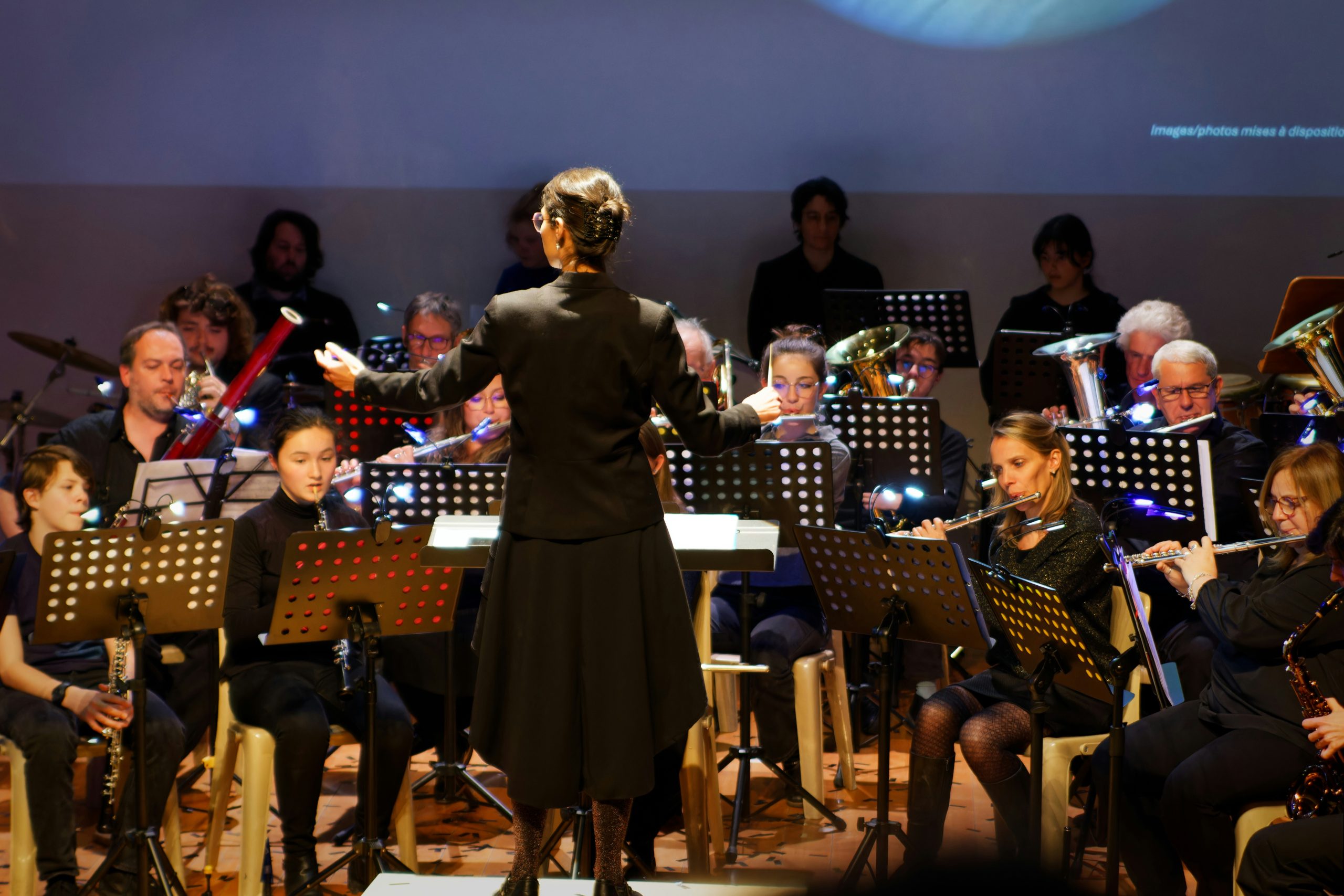 Wind orchestra with conductor